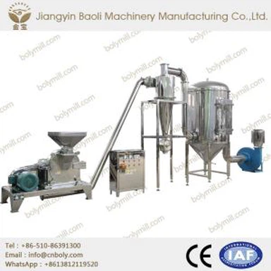 Röd chilipulvermaskin